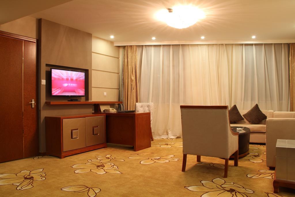 Harbin Victories Hotel Værelse billede