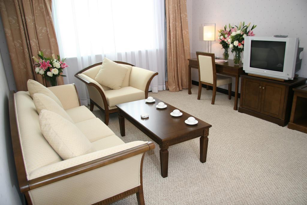 Harbin Victories Hotel Værelse billede
