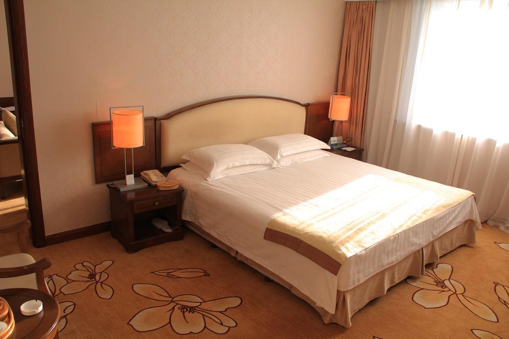 Harbin Victories Hotel Værelse billede